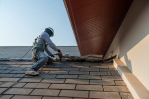 man preparing the roof